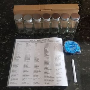 Empty square glass spice jars